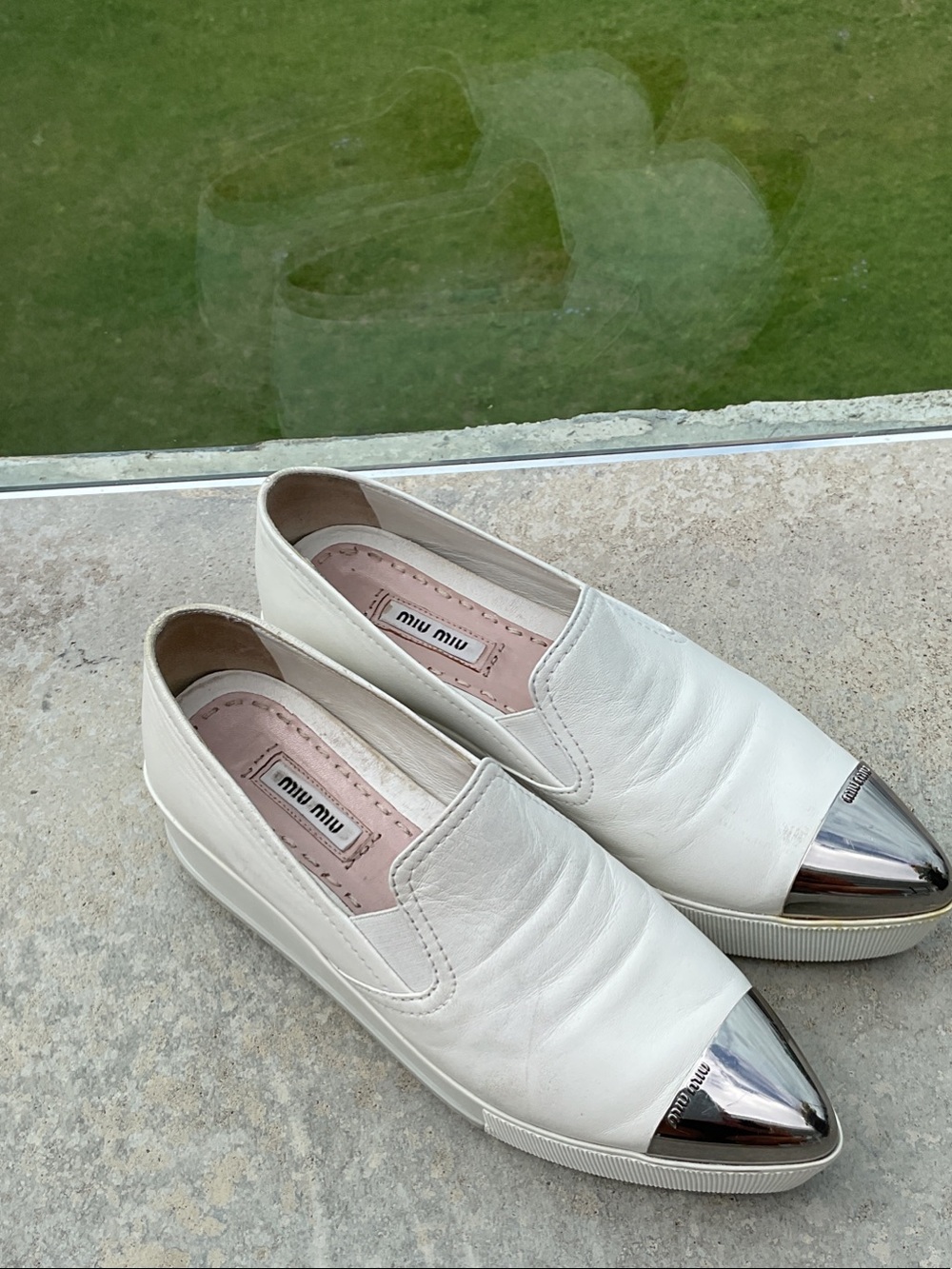 Miu Miu White Leather Slip-On Sneakers with Silver Cap Toe and Wedged Heel